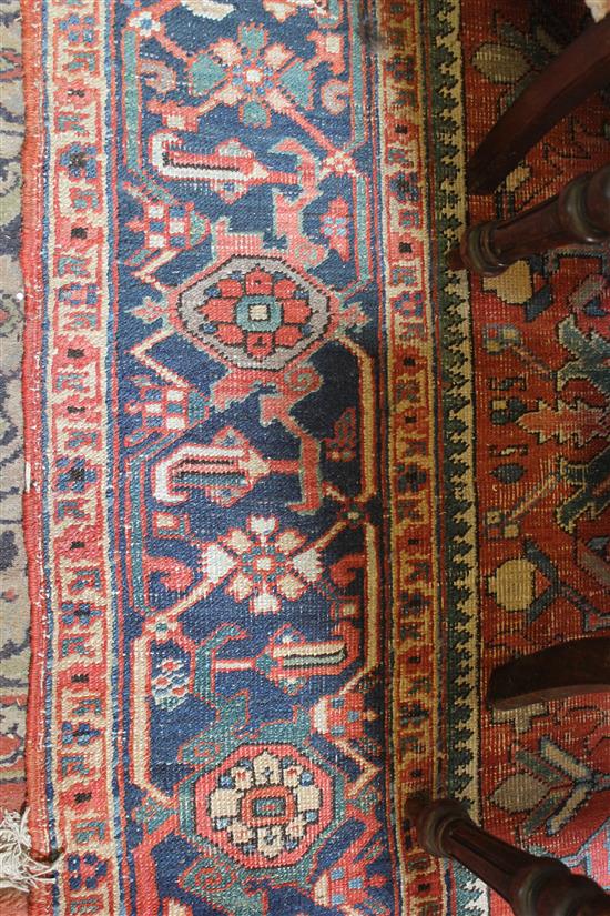 Red & blue Heriz carpet (worn)